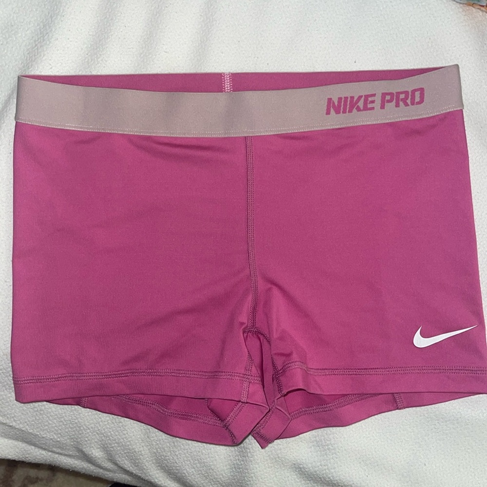 Women’s pink Nike Pro shorts